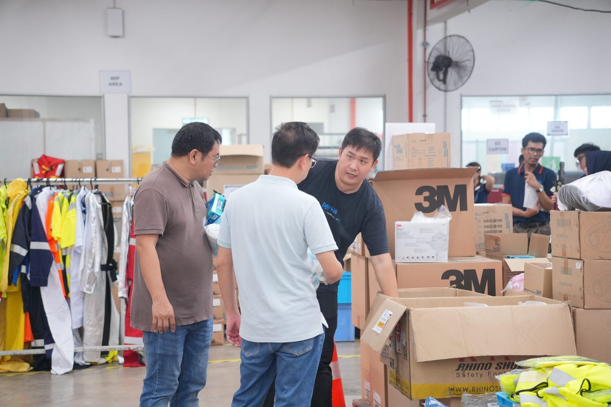Visitors and staff at the Safetyware Warehouse Sale in Penang