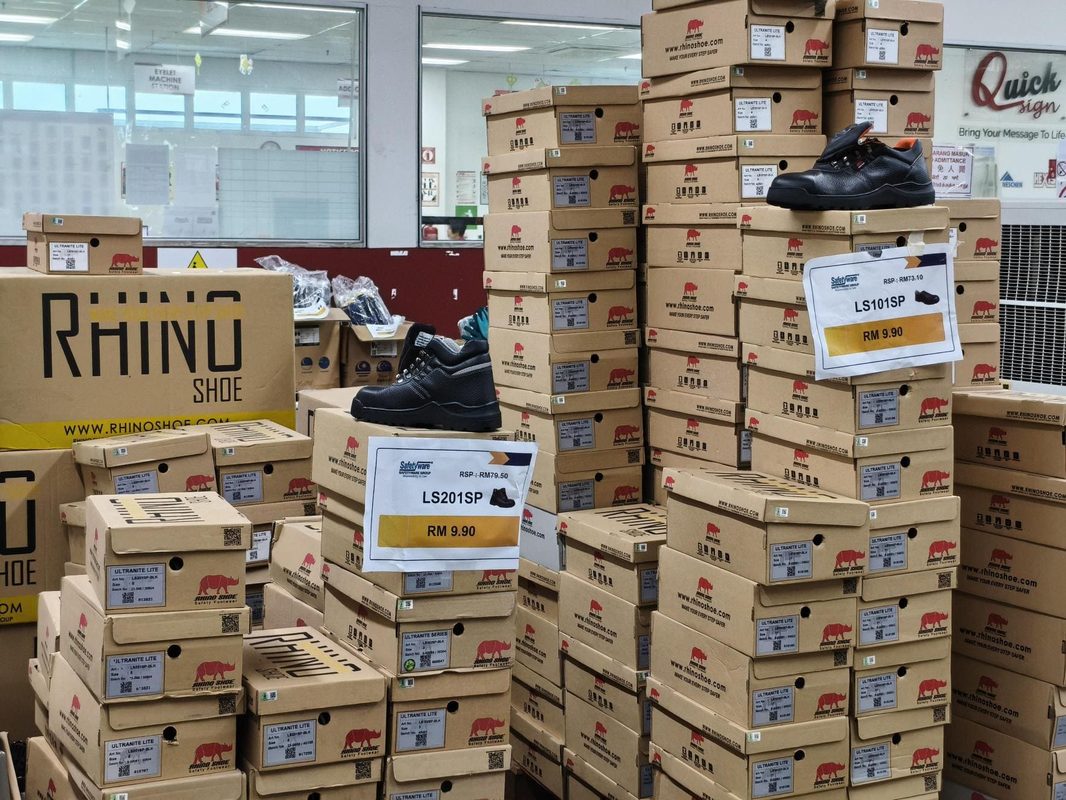 RHINO SHOE LS101SP and LS201SP display with RM9.90 sale signs